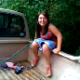 A girl takes a shit off of the side of her truck. We cannot hear the shit, but her facial expressions are visible, along with the comments from her friends in the background about the awful smell.